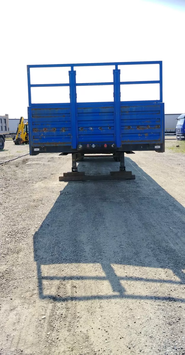Туймазинский завод автобетоновозов 588513 Полуприцеп бортовой
