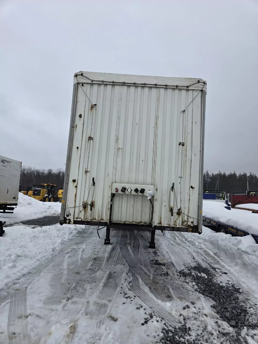 Туймазинский завод автобетоновозов 588510 Полуприцеп шторный
