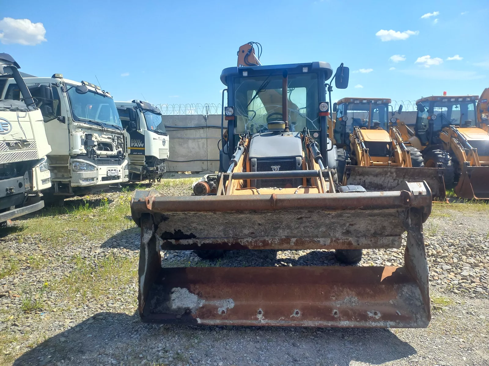 Case 570ST Экскаватор-погрузчик