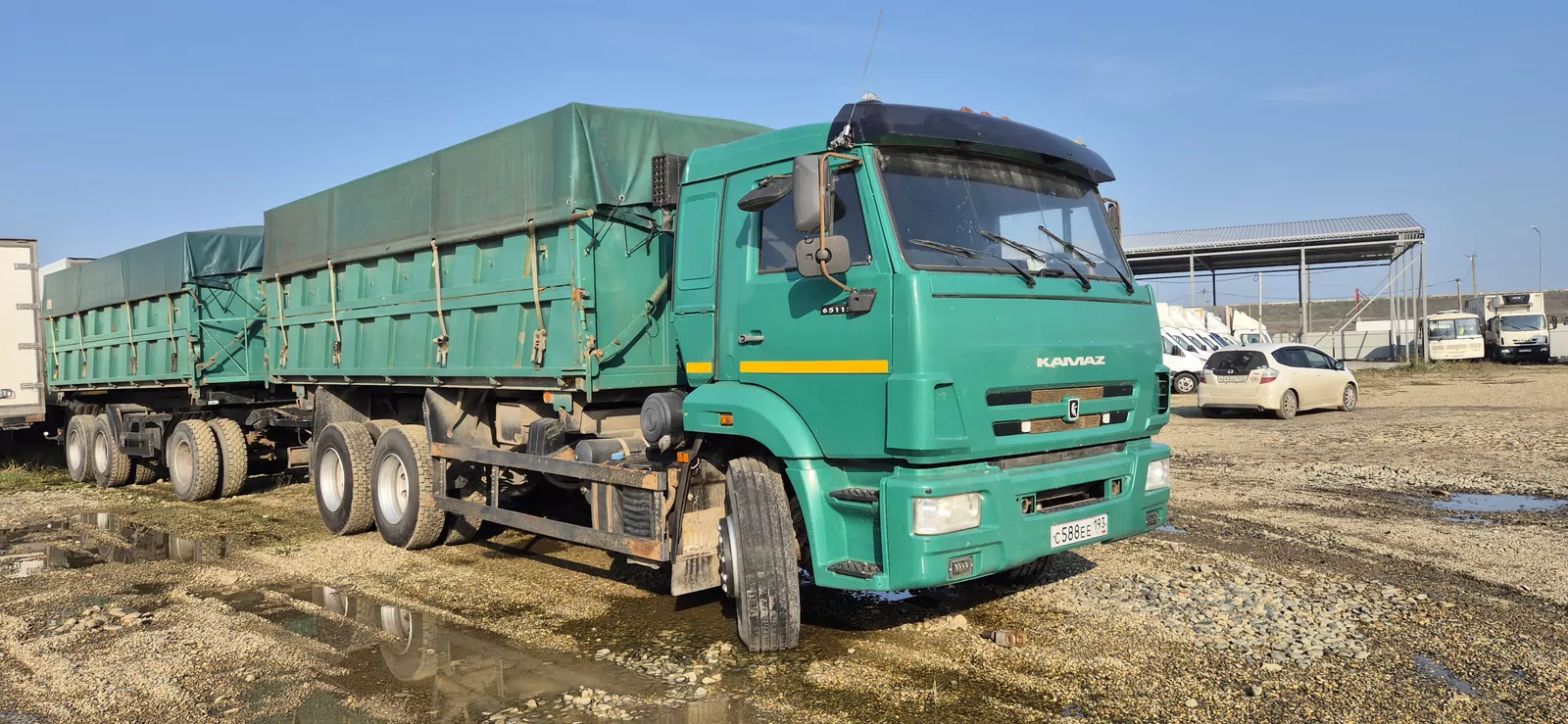Планета 552919 на шасси КамАЗ 65115 6x4 Зерновоз
